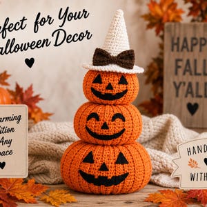 May include: A stacked crochet pumpkin figurine featuring three orange pumpkins with black stitched jack-o'-lantern faces. The top pumpkin wears a white pointed hat with a brown bow. The text reads Perfect for Your Halloween Decor, A Charming Addition to Any Space, HAPPY FALL Y'ALL, and HANDMADE WITH LOVE.