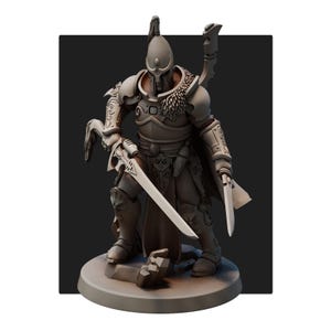 May include: A detailed, gray-toned figurine of a warrior in ornate armor, holding two swords. The figure stands on a circular base with a rocky terrain, showcasing intricate design and a dynamic pose. The warrior wears a helmet and cape.