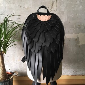 macaw wings leather backpack
