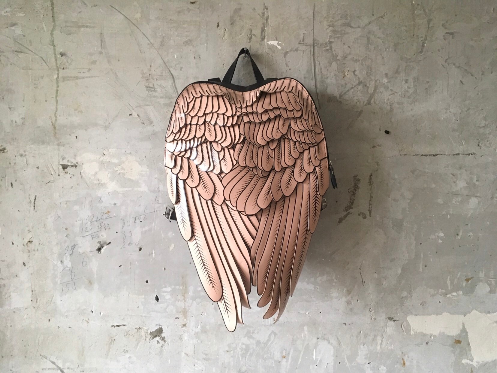 wings leather backpack