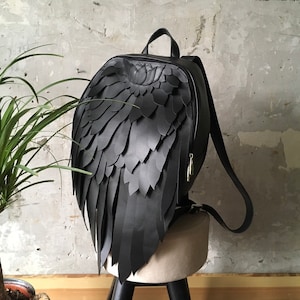 macaw wings leather backpack