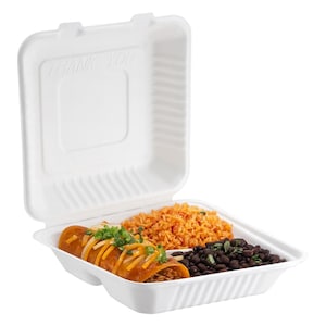 May include: A white, hinged takeout container with a meal of Mexican food. The container holds a burrito, rice, and black beans. The burrito is topped with cheese and green onions. The container lid has the words "THANK YOU" printed on it.