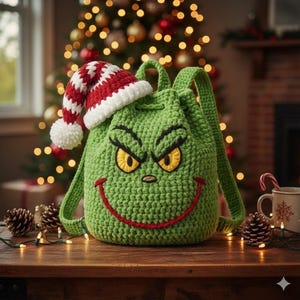 May include: A green crochet backpack featuring the Grinch's face with yellow eyes, a red smile, and black eyebrows. A red and white Santa hat rests on top. The backpack has adjustable straps and a drawstring closure, perfect for Christmas.