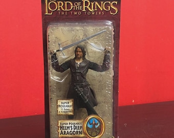 Herr der Ringe Die Zwei Türme Super Poseable Helm's Deep Aragor Actionfigur