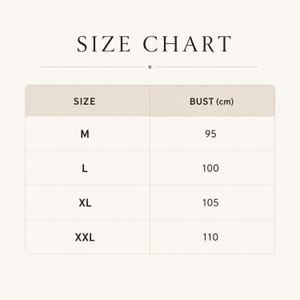May include: A size chart table with the heading SIZE CHART. The table lists sizes M, L, XL, and XXL in the left column and corresponding bust measurements in centimetres in the right column: 95, 100, 105, and 110. The text is black on a light background.