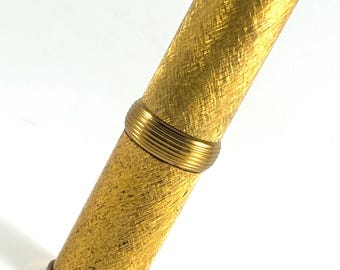 Vintage lippenstiftdoosje Revlon 563