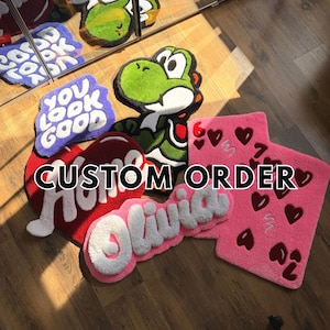 May include: A collection of custom-made rugs in various shapes and colors. Includes a green Yoshi rug, a pink rug with hearts, and rugs with the words "You Look Good", "Home", and "Olivia". The text "CUSTOM ORDER" is also visible.