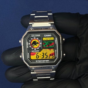 Orologio Casio AE1200 personalizzato Jurassic Park – Nublar Signal – Dinosaur Casio Royale Mod