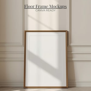 Peut inclure: Maquette de cadre de sol rectangulaire en bois avec un intérieur blanc, appuyée contre un mur beige. Le cadre a une fine bordure marron. Le texte "Floor Frame Mockups" et "CANVA READY" est affiché en haut.