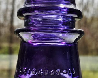 Antique Hemingray-16 Glass Insulators Stained Purple from the 1940's.