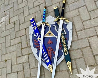 Juego de espadas de Maestro 2 de Legend of Zelda hecho a mano con escudo Hyliano, ideal para cosplay o como decoración para regalos.