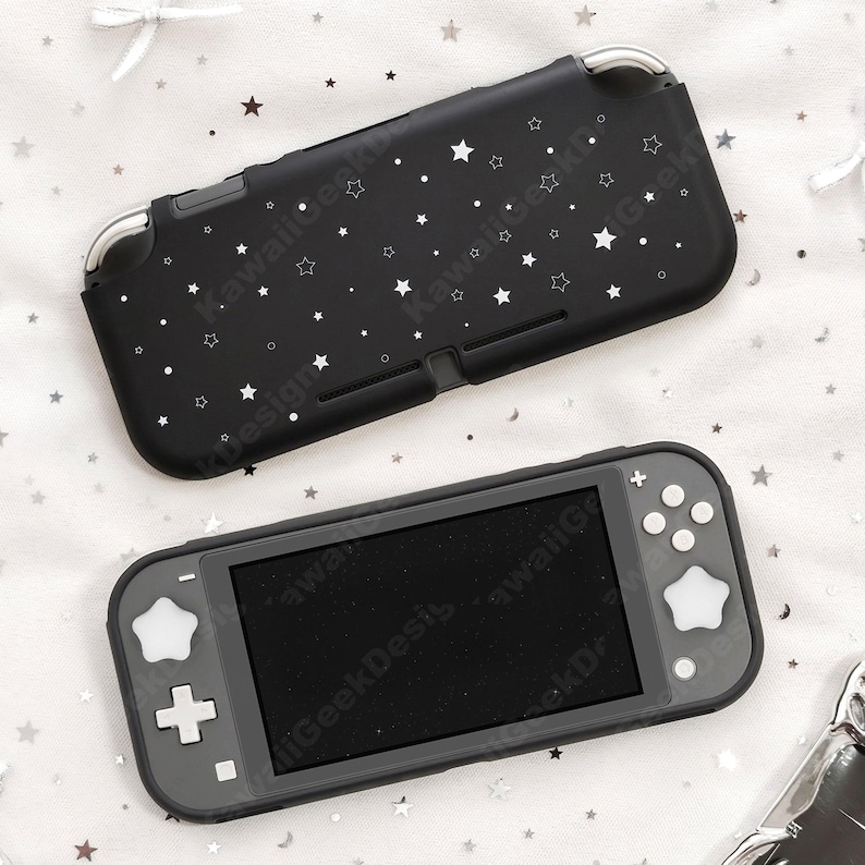 May include: Black Nintendo Switch Lite case with a white star pattern. The case is shown with the console, which has a black screen and gray buttons. The case is designed to protect the console from scratches and damage.