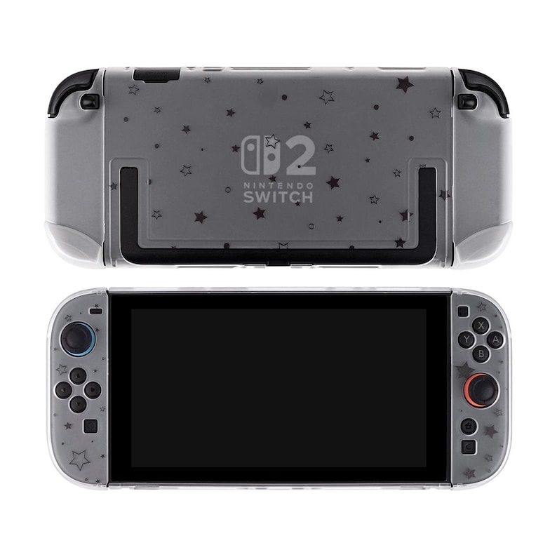 May include: A gray Nintendo Switch console with a clear protective case. The case is decorated with small black star shapes. The console has black buttons and a black screen. The Nintendo Switch logo is visible on the back of the console.