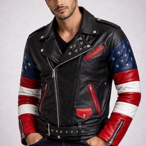 May include: Black leather jacket with red, white, and blue detailing. The jacket has a zip closure, star embellishments, and a belt. The sleeves display a patriotic design with stripes and stars.