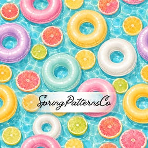 May include: A repeating pattern of colorful inflatable pool rings and citrus fruit slices floating on blue water. The rings are pink, yellow, purple, white, and teal. The fruit includes grapefruit, orange, and lime slices. Text reads SpringPatternsCo.