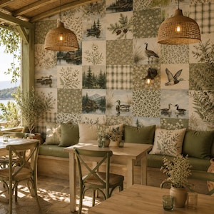 May include: A wall covered in square tiles featuring a patchwork of nature-themed illustrations including ducks, pine trees, mountains, and floral patterns in shades of green, beige, and white. The wall is set behind a wooden bench with green cushions.