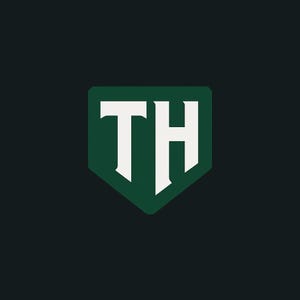 May include: A logo featuring the letters "TH" in white, set against a dark green shield-shaped background. The design is simple and bold, with a modern, minimalist aesthetic. The background is a dark shade of green.