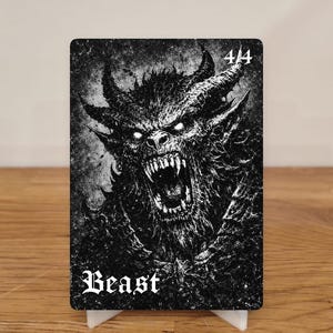 May include: A black and white image of a demonic beast with horns and glowing eyes, labelled "Beast" with the stats "4/4". The image is displayed on a small white stand.