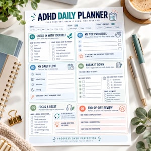 May include: A white ADHD daily planner sheet with blue and green text and icons. The layout includes six numbered sections for daily check-ins, priorities, task breakdown, flow, focus, and end-of-day review, with the title ADHD DAILY PLANNER.