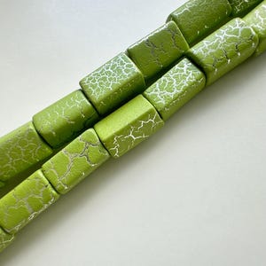 May include: A rustic wooden sign with the text "Welcome to our home" in white lettering. The sign features a distressed finish and a simple, inviting design, perfect for front door decor.