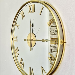 Grote gouden spiegelwandklok, extra grote metaalkunst, luxe Romeinse cijfers