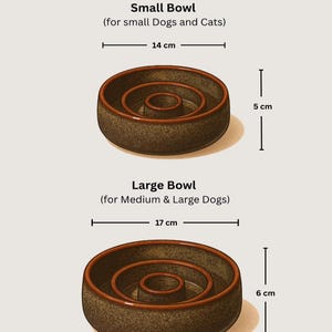 May include: Two brown ceramic slow feeder bowls with a textured finish and a central raised pillar. The small bowl measures 14 cm in diameter and 5 cm in height. The large bowl measures 17 cm in diameter and 6 cm in height. Text labels indicate sizes for pets.
