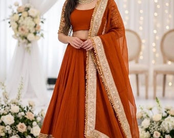 Lehenga Choli aus rostorangem Georgette, indische Hochzeitskleidung, Stickerei im Bollywood-Stil
