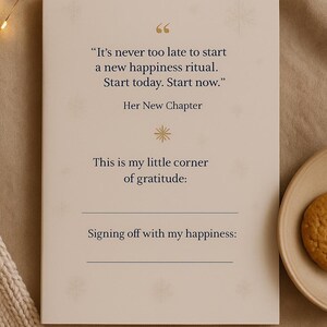 May include: A cream-coloured journal with the text "It's never too late to start a new happiness ritual. Start today. Start now." and "Her New Chapter." The journal includes prompts for gratitude and happiness.