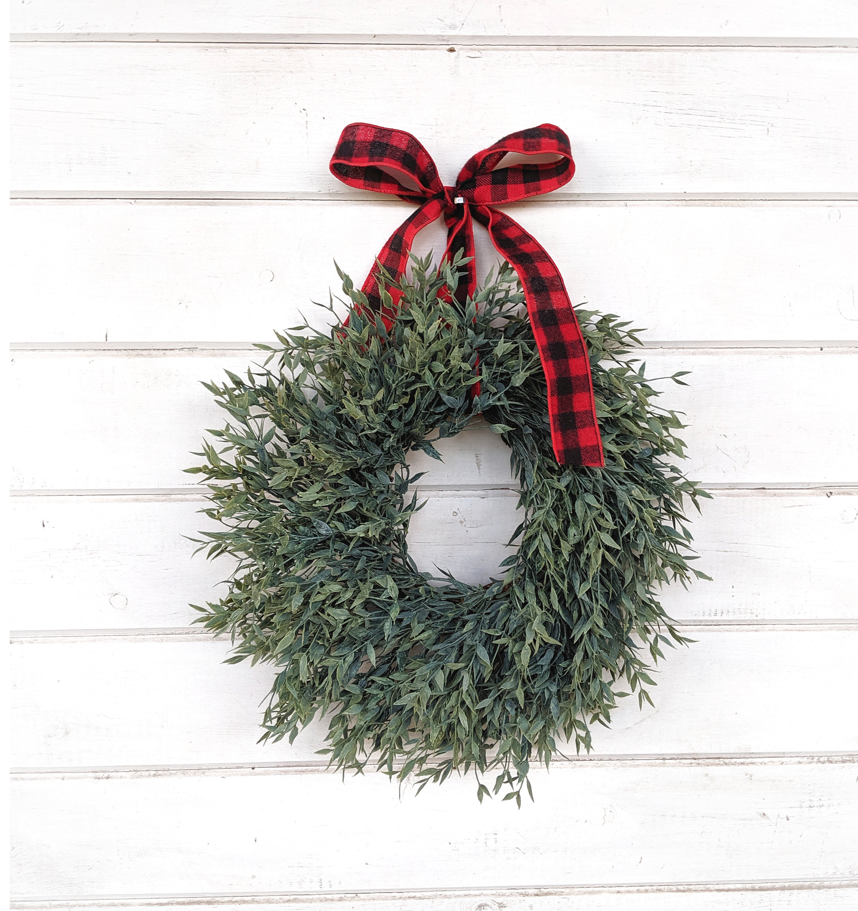 Small Christmas Wreaths In Windows