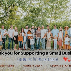 May include: A group of people, including adults and children, stand in front of a green forest. They are smiling and looking at the camera. The text "Thank you for Supporting a Small Business" is written below the image, along with the text "Celebrating 10 Years in Business", "38,000+ Sales", "*Made in USA*" and "7,000+ 5 STAR Reviews".