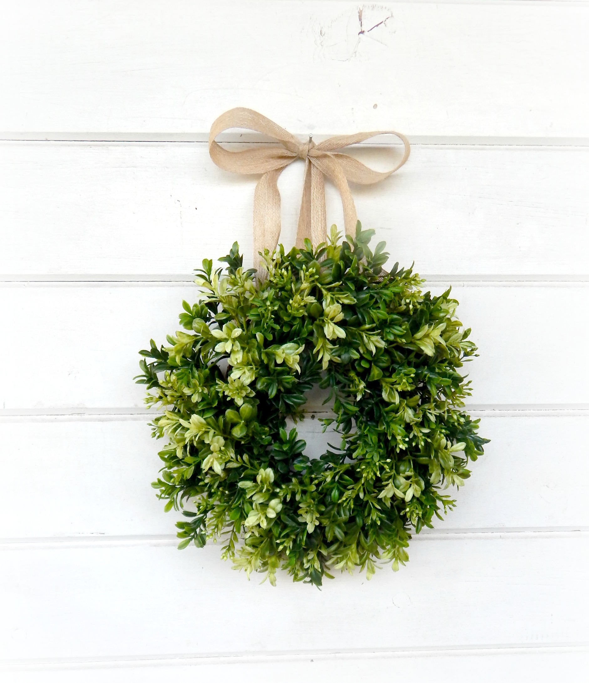 9. Verdant Accents: Mini Boxwood Wreaths