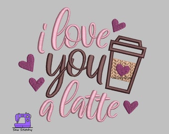 May include: Embroidered design with pink and brown lettering that reads "I love you a latte" with a brown coffee cup and hearts.