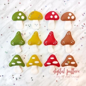May include: A digital pattern for sewing felt mushrooms. The pattern includes a step-by-step tutorial. The mushrooms are in red, green, yellow, and brown with white spots.