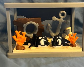 Tiburones negros en 3D con tanque