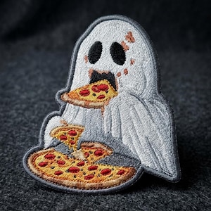 May include: An embroidered patch featuring a white ghost with black eyes and mouth, eating a slice of pepperoni pizza while holding another slice above a whole pizza. The design uses white, yellow, red, and black thread with a dark gray border.