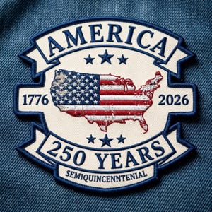 May include: A circular embroidered patch featuring a map of the United States filled with the American flag pattern. The text reads AMERICA, 1776, 2026, 250 YEARS, and SEMIQUINCENTENNIAL, accented by six blue stars on a cream background with blue borders.