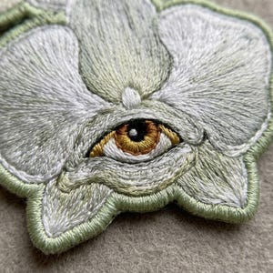 Orchid Eye Patch - Surreal Floral Embroidery, White Orchid Eye Badge, Weirdcore Aesthetic Gift, Dark Academia Iron On, Gothic Botanical Art