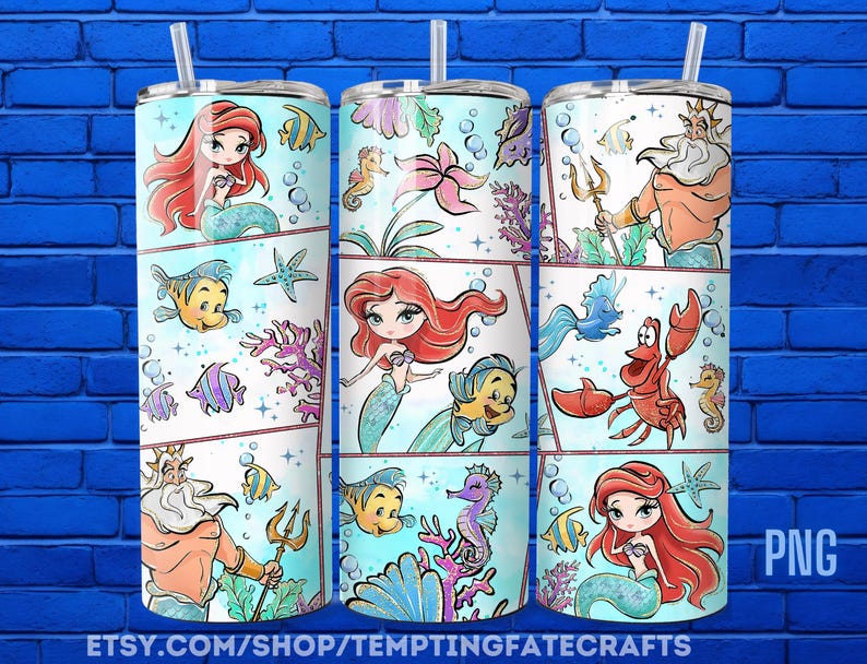 A collection of three colorful tumblers featuring illustrations of mermaids and marine life, such as fish and sea creatures, against a blue brick wall background.