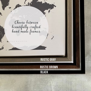 May include: Close-up of a world map print framed in three different colors: rustic gray, rustic brown, and black. The text "Choose between beautifully crafted hand made frames" is visible in the center of the image.