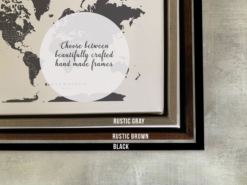 May include: Close-up of a world map print framed in three different colors: rustic gray, rustic brown, and black. The text "Choose between beautifully crafted hand made frames" is visible in the center of the image.