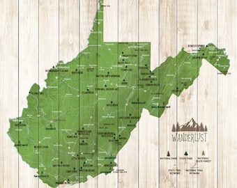 May include: A green map of West Virginia with the state parks, national parks, and forest system highlighted. The map is on a woodgrain background with the text "Never Stop Exploring" at the bottom.