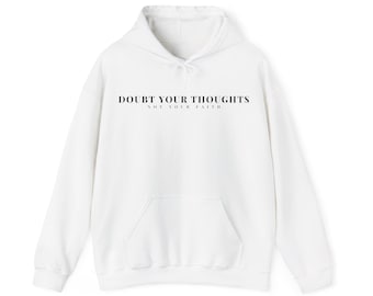 May include: White hoodie with a front pocket and drawstring hood. The text "DOUBT YOUR THOUGHTS" is printed across the chest, with "NOT YOUR FAITH" below it. The hoodie is a casual style.