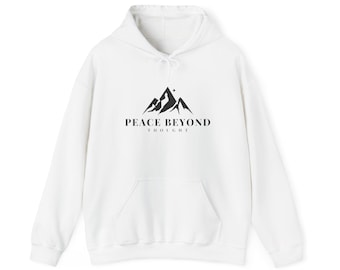 May include: White hooded sweatshirt with a front pocket and drawstring. The front features a black mountain graphic with the text "PEACE BEYOND THOUGHT". A casual, comfortable garment for everyday wear.