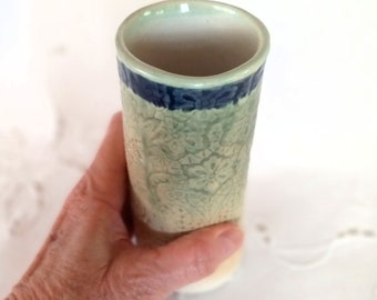 Cylindrical Pottery Vase, Floral Lace Texture in Variegated Greens with a Blue Banded Rim