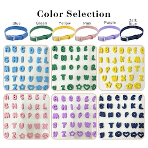 May include: A collection of six colored collars in blue, green, yellow, pink, purple, and dark blue, each paired with a matching set of alphabet letter beads and symbols including stars, hearts, flowers, and paw prints for customization.