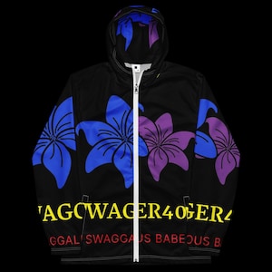 May include: Black zip-up hooded jacket with a floral design in blue and purple. The jacket features a white zipper and the text "'AGCWAGER40GERZ" in yellow and "GGAL! SWAGGAUS BABEOUS B" in red.