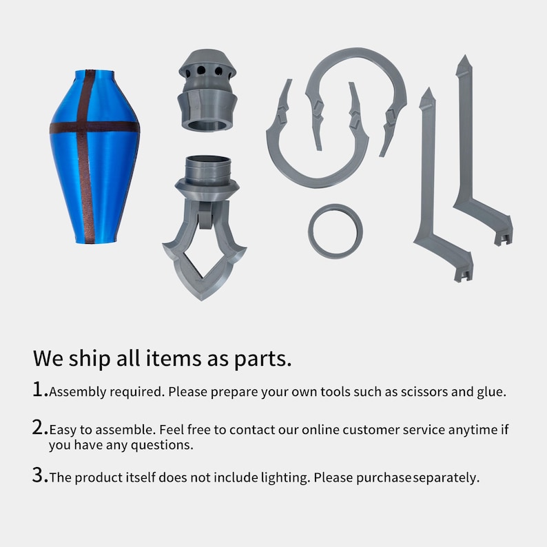 May include: A collection of disassembled decorative components in blue and grey. The main piece is a blue vase-like shape with a brown cross design. Other parts include a ring, curved elements, and vertical supports. The image text reads, "We ship all items as parts."