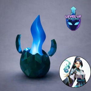 May include: A teal and blue decorative egg-shaped object with a blue flame emanating from the top. The egg has a geometric design and two curved teal pieces on either side. A logo with the text "LEVEL UP PERSONA" is in the upper right.