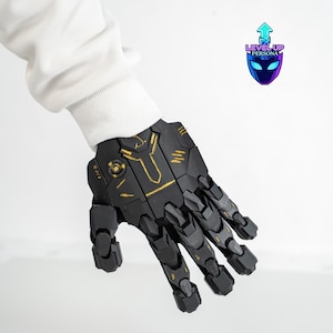 May include: Black and gold robotic hand with articulated fingers. The hand has a geometric design with gold accents. The Level Up Persona logo is visible in the upper right corner.