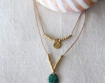 Collar con dije de sol de malaquita